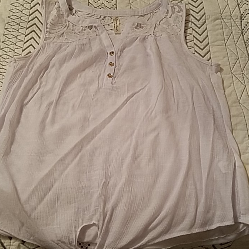 White sleeveless blouse